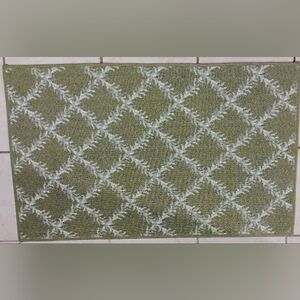 Green and White Patterned Rug